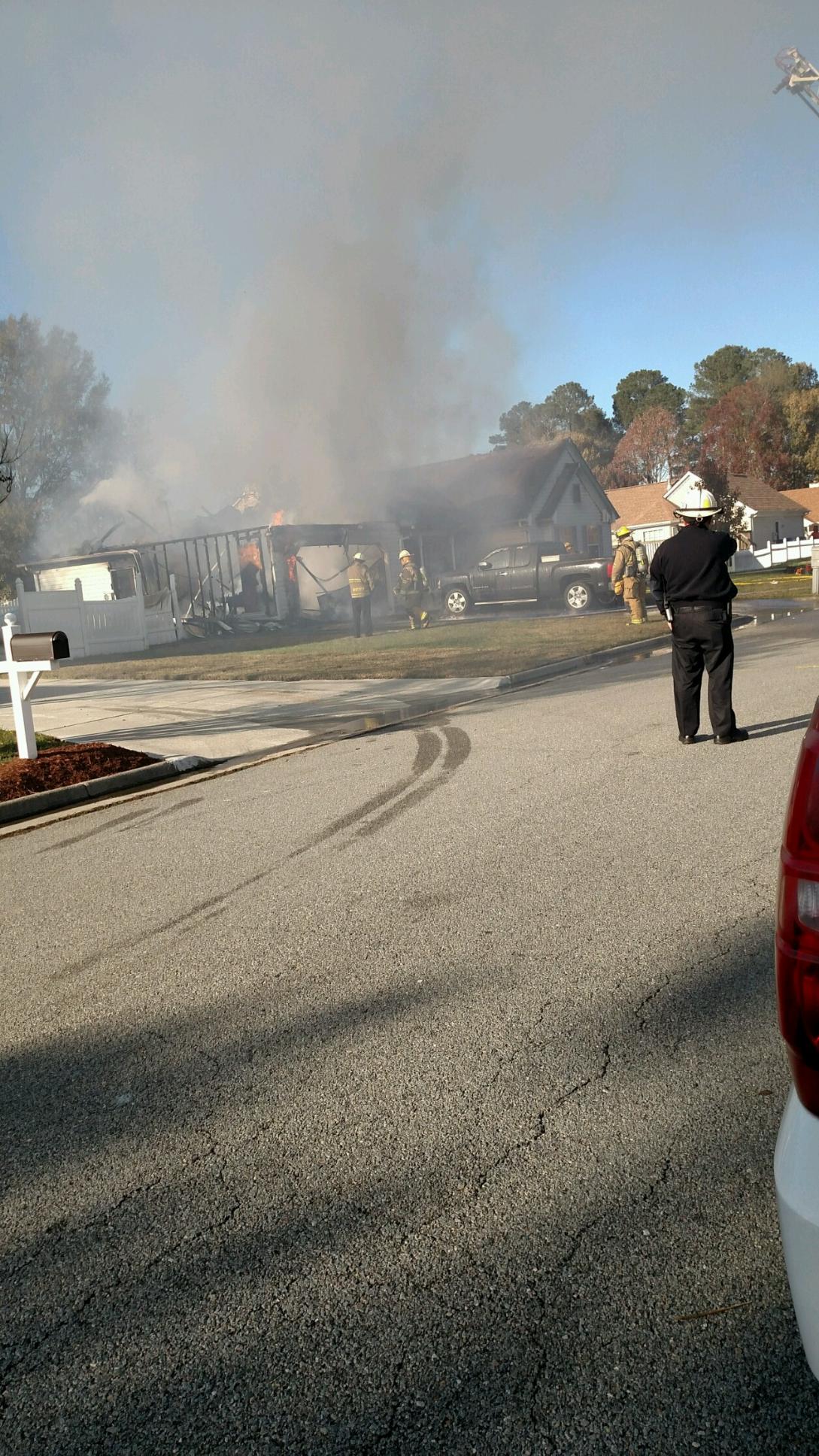 Firefighter injured in Suffolk house fire