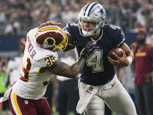 Cowboys hold off Redskins for 10th straight win