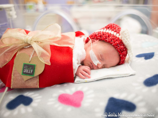 See photos of Santa visiting with tiny babies in a NICU
