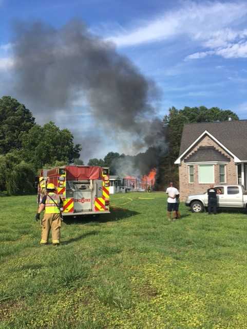 Crews battle shed fire in Suffolk | 13newsnow.com