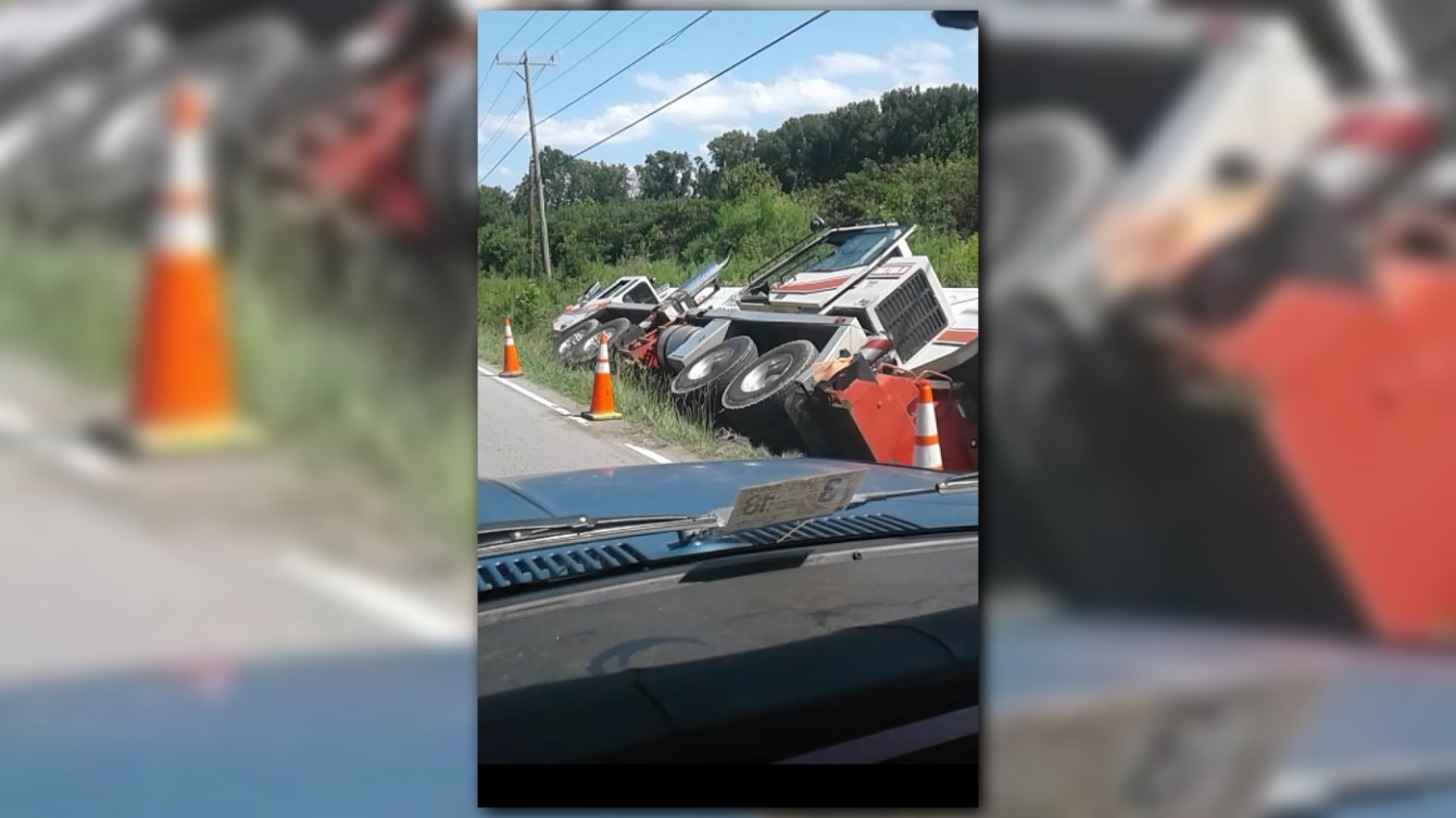Crane goes into ditch near John Holland Landfill in Suffolk